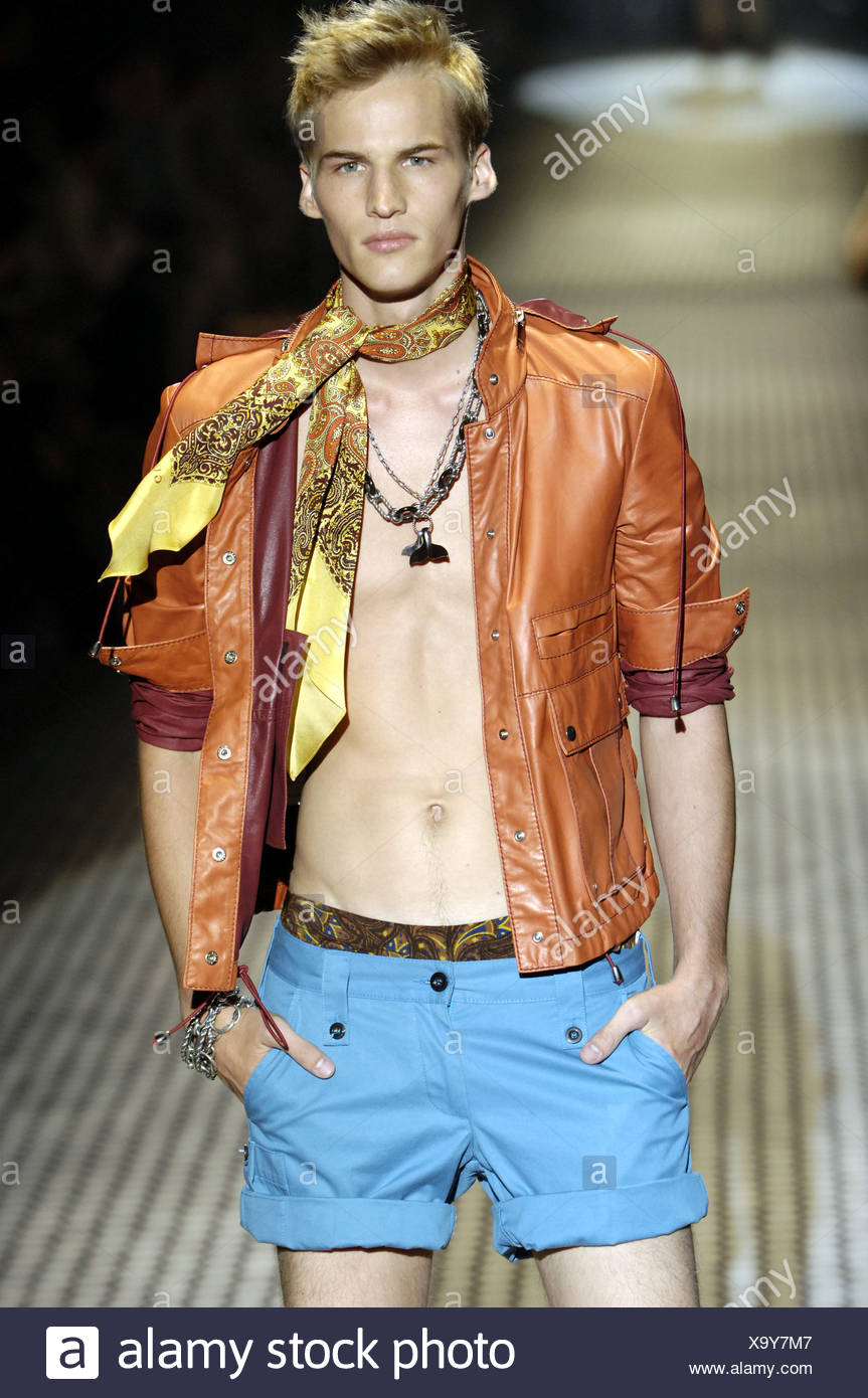 Gucci Milan Ready to Wear Menswear Spring Summer Shirtless blonde male model  walking down the runway wearing an open brown Stock Photo - Alamy