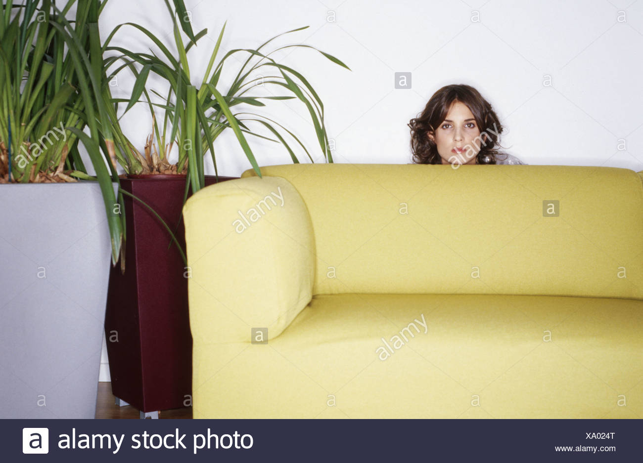 Woman Hiding Behind Couch Stock Photo 281514152 Alamy