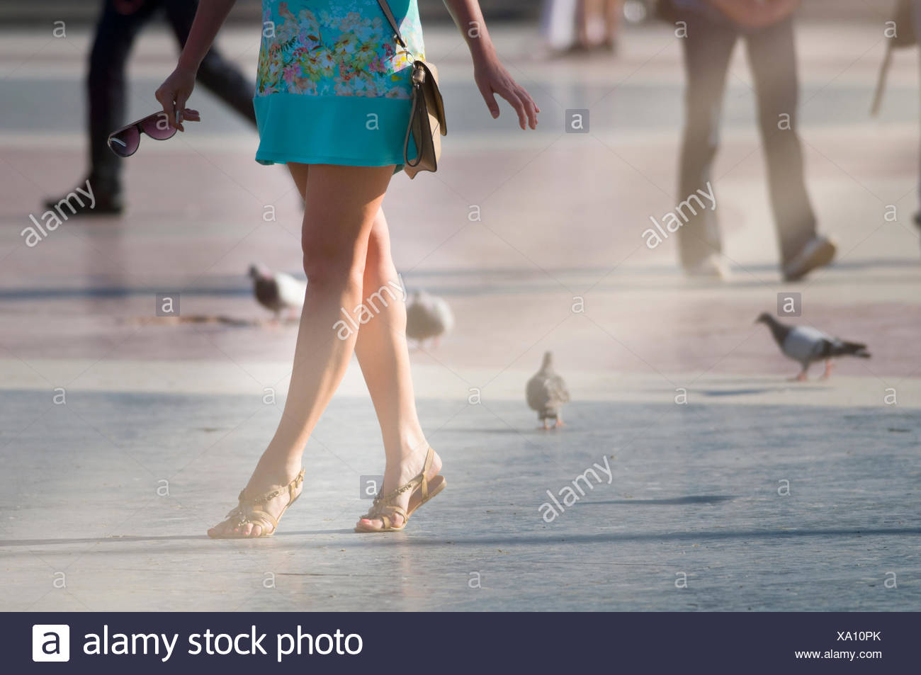 girls walking in short skirts