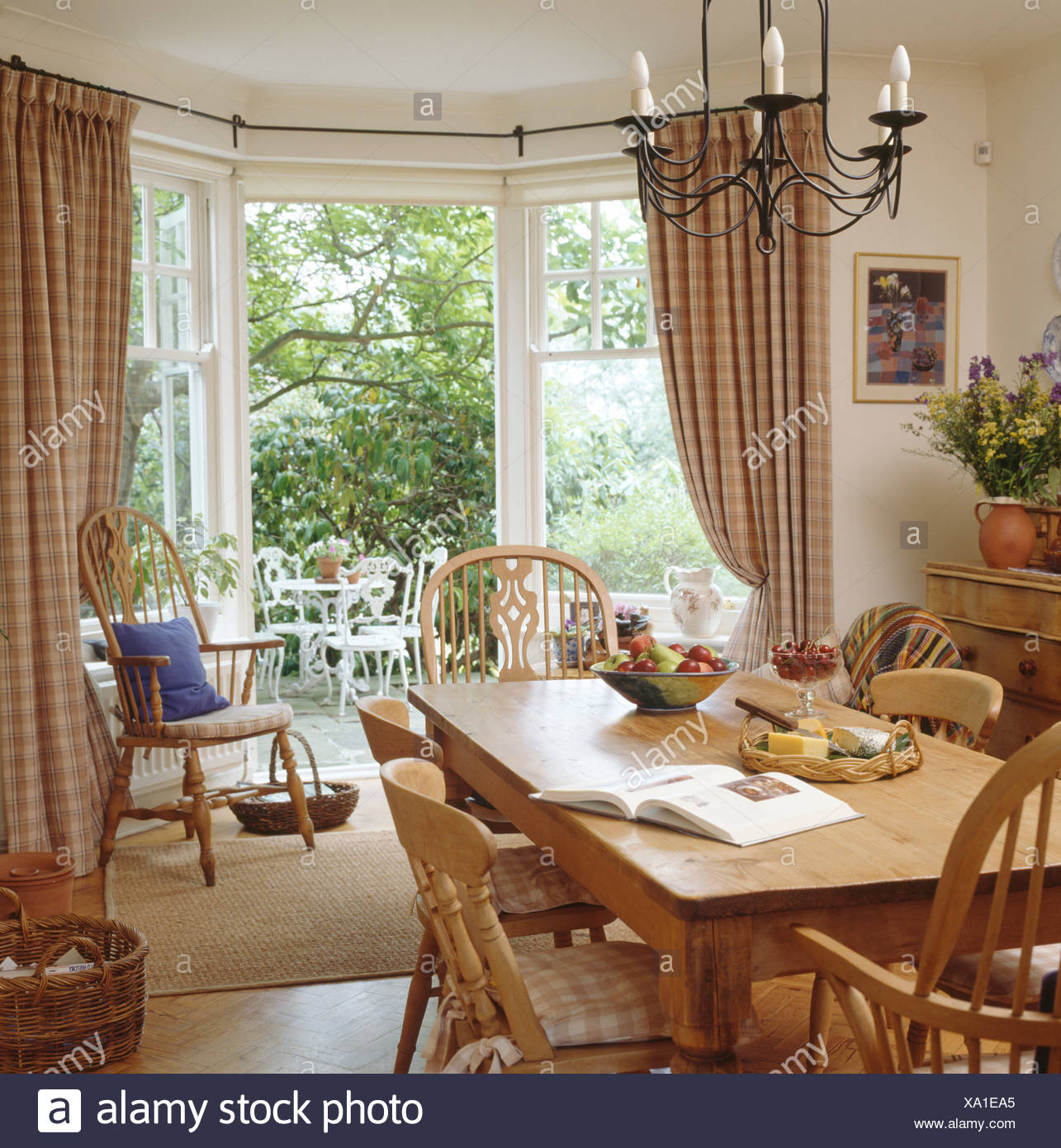 Pine Table And Chairs In Neutral Diningroom With Checked