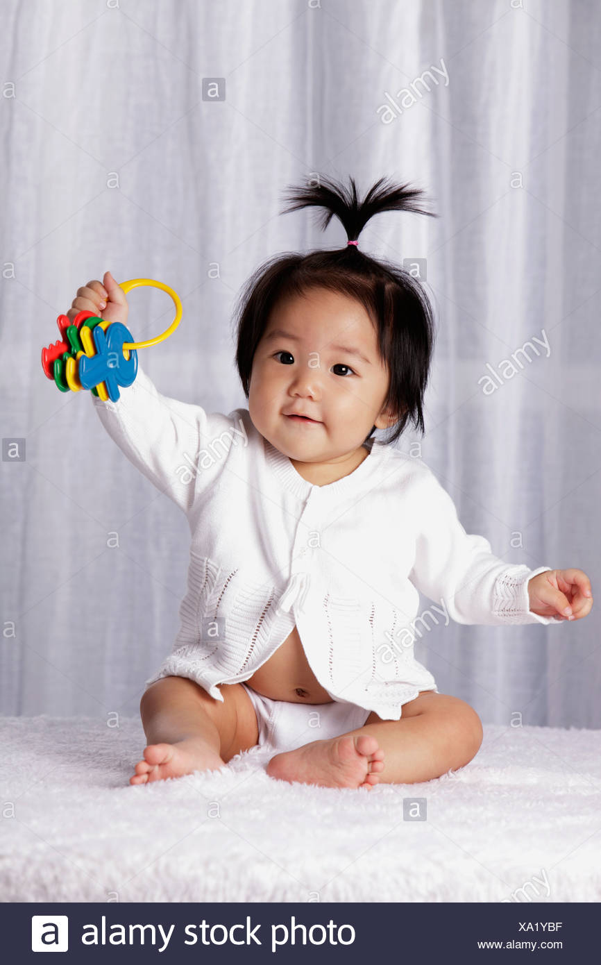 baby holding toy