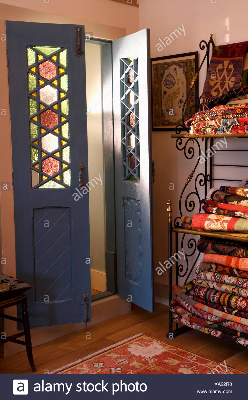 Black Double Doors With Stained Glass Panels In Small Hall