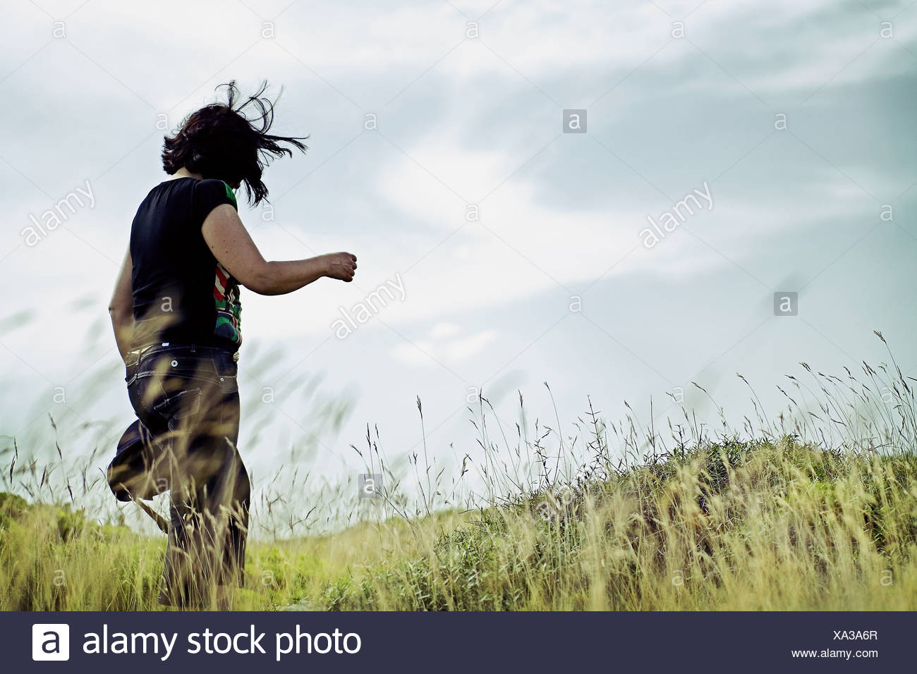 Women Walking Freely Through The Countryside Stock Photo Alamy Women Walking Freely Through The Countryside Stock Photo Alamy