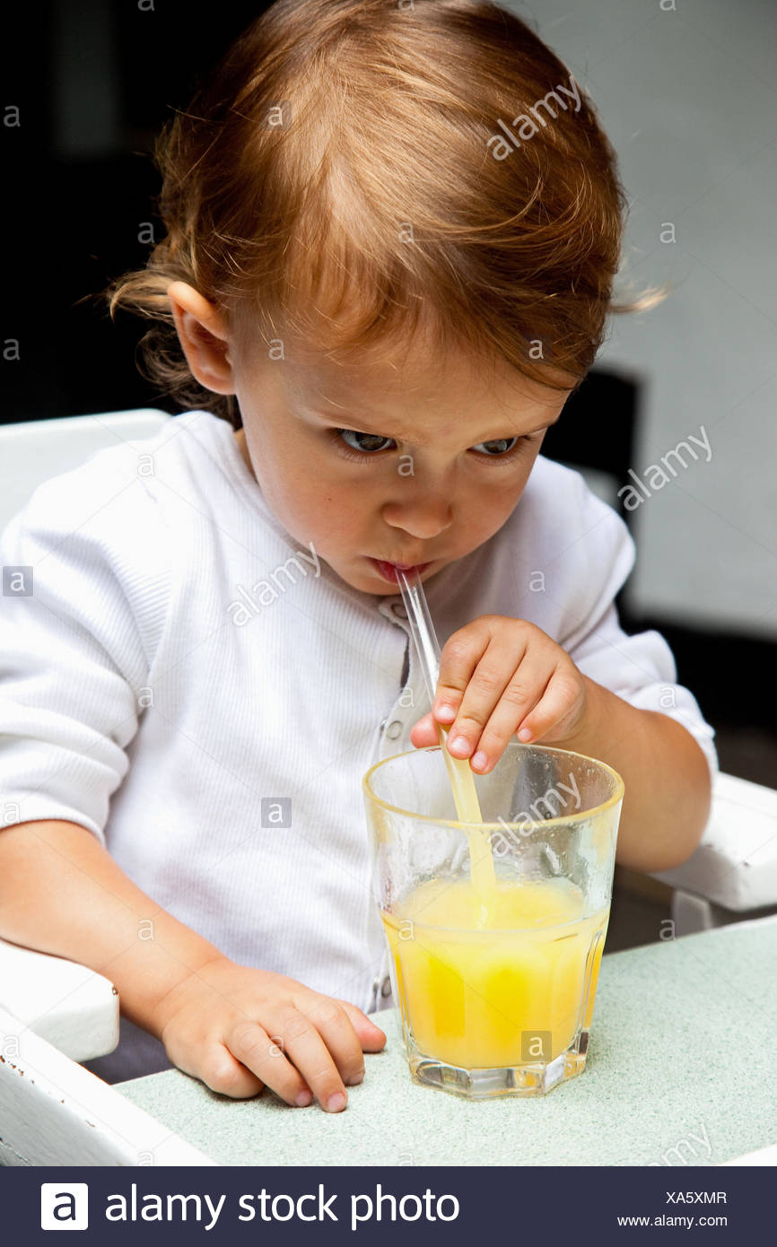 Month Old Baby Girl Drinking Fruit Juice Stock Photo Alamy