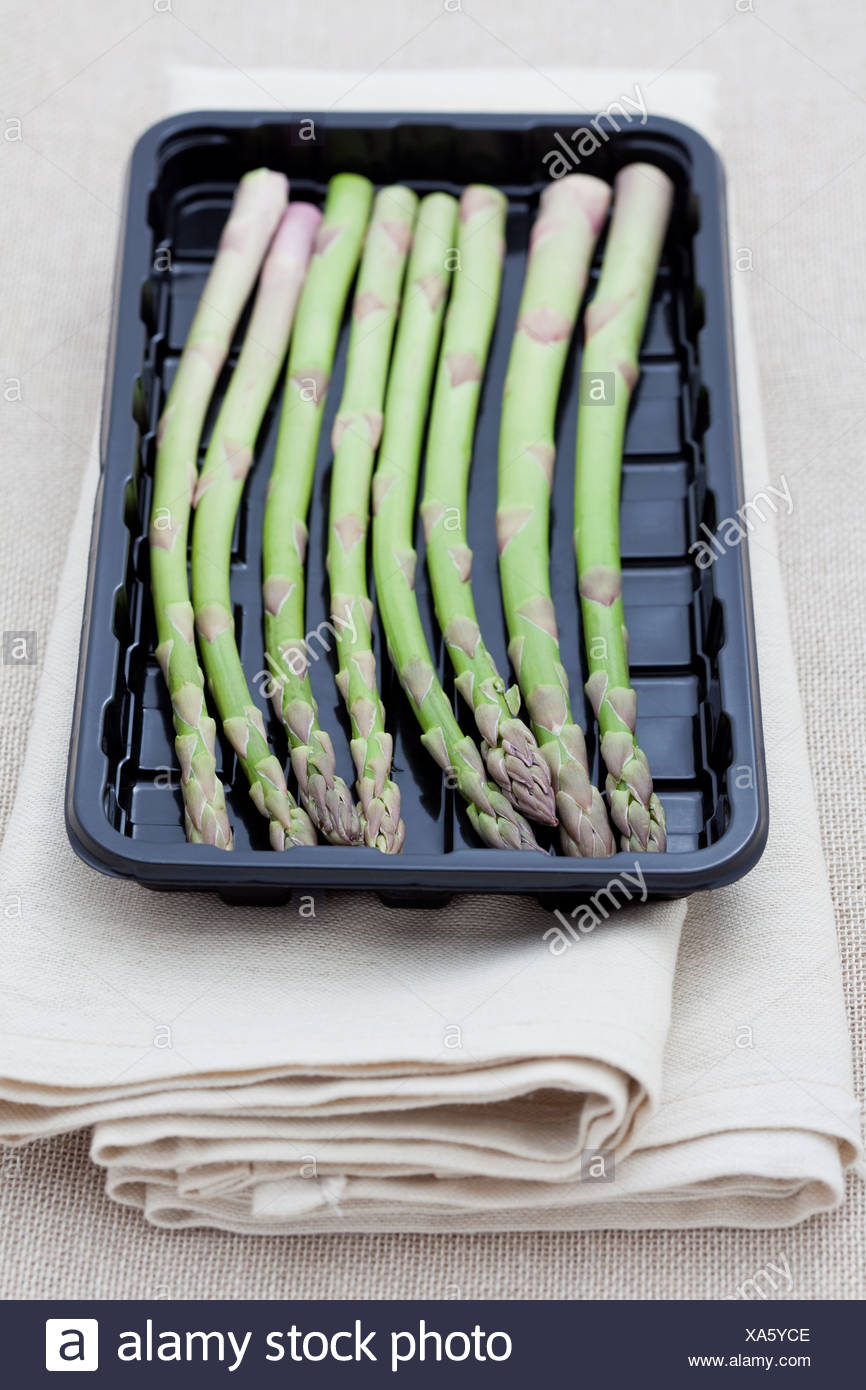 Download Fresh Asparagus In A Plastic Tray Stock Photo Alamy Yellowimages Mockups