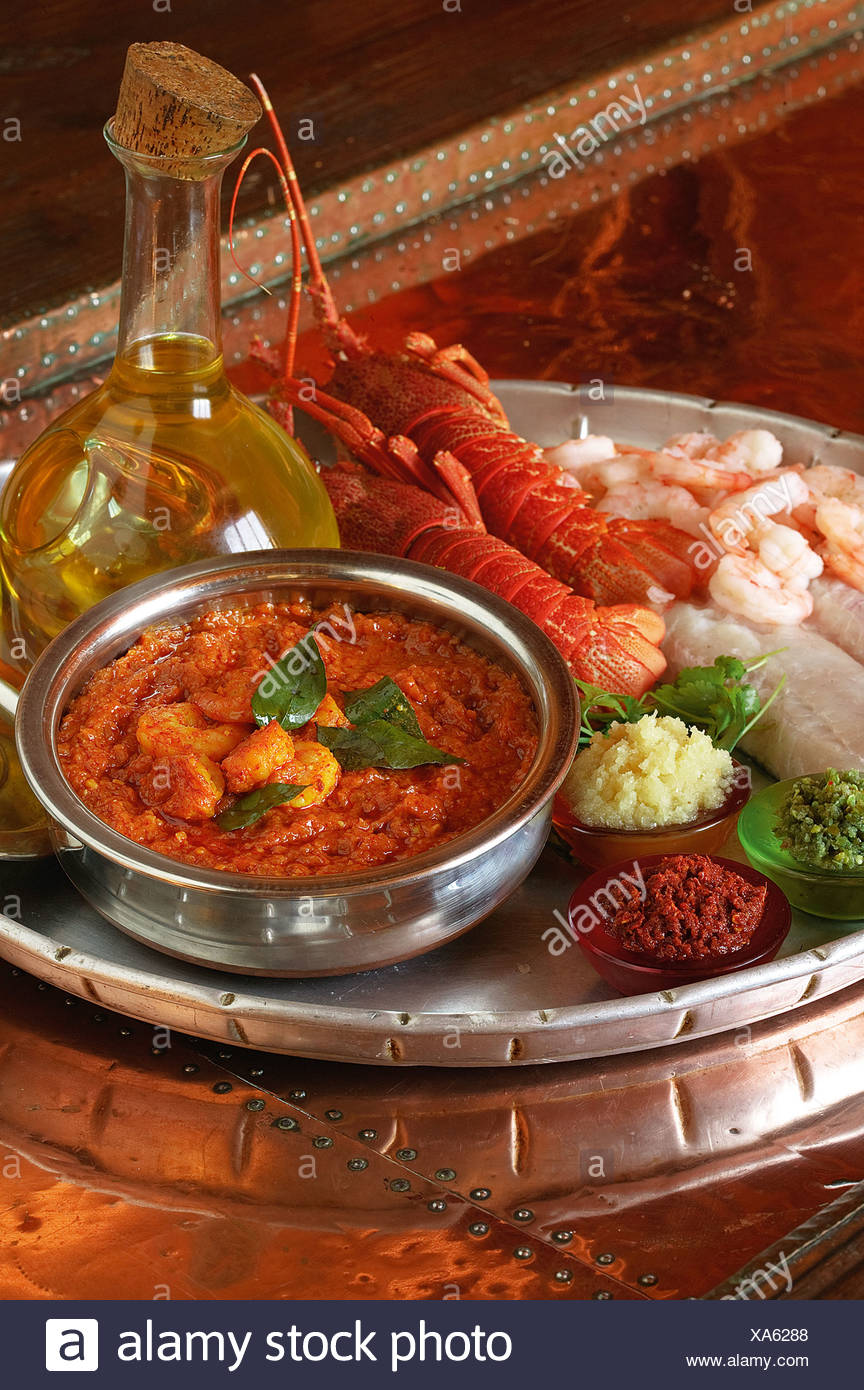 Indian Cooking Goan Seafood Curry Made With Tiger Prawns Kingklip And Crayfish Tails Stock Photo Alamy