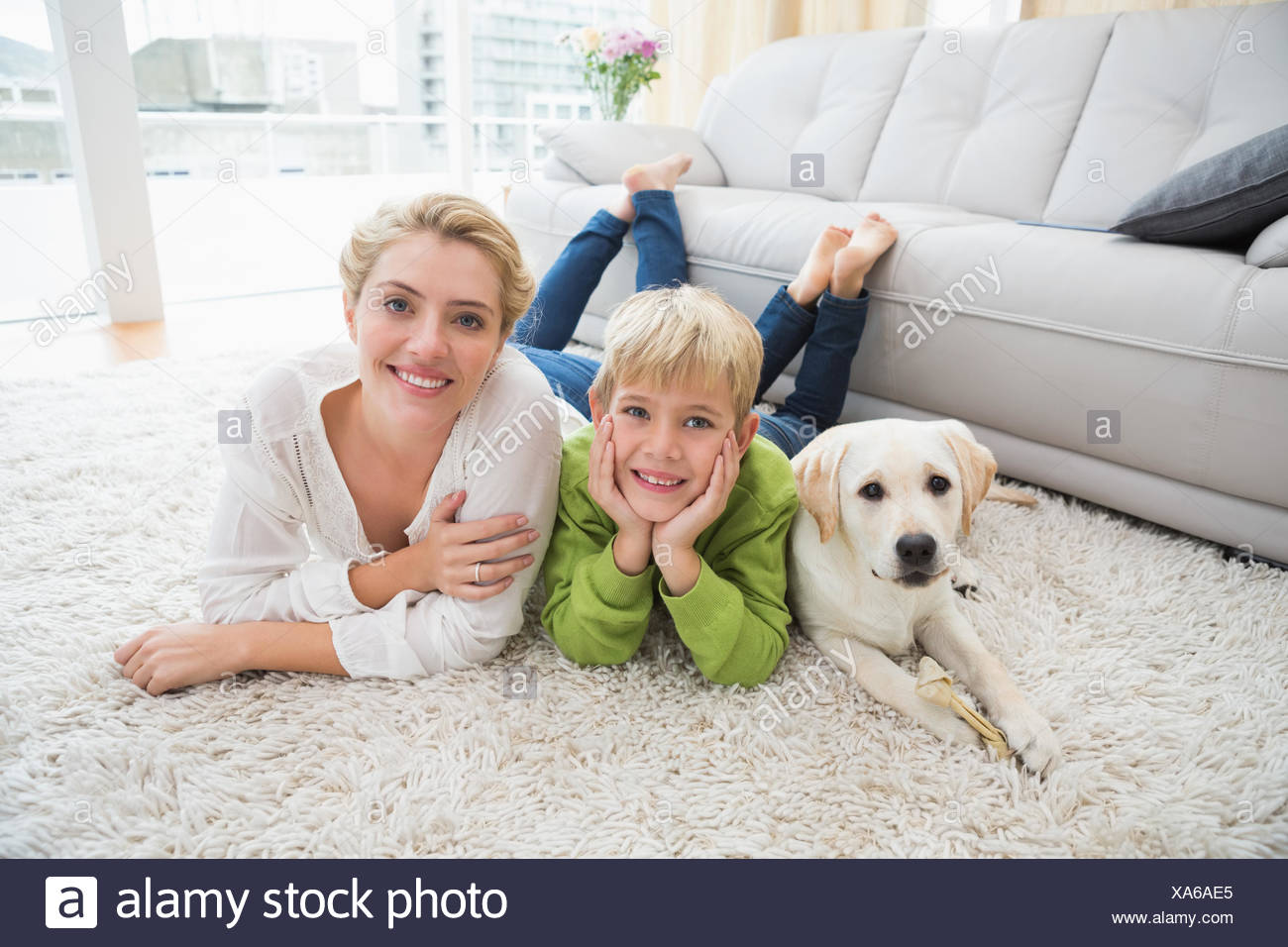 Happy Mother And Son With Puppy Stock Photo 281652397 Alamy