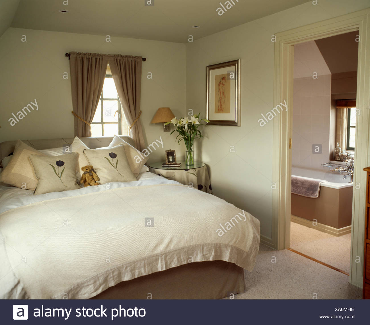 Linen Edged Cream Fleece Bed Cover And Cream Cushions On Bed