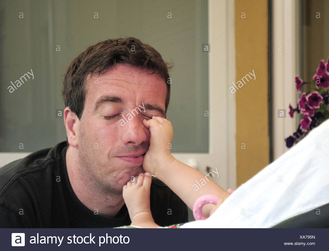 baby foot on face