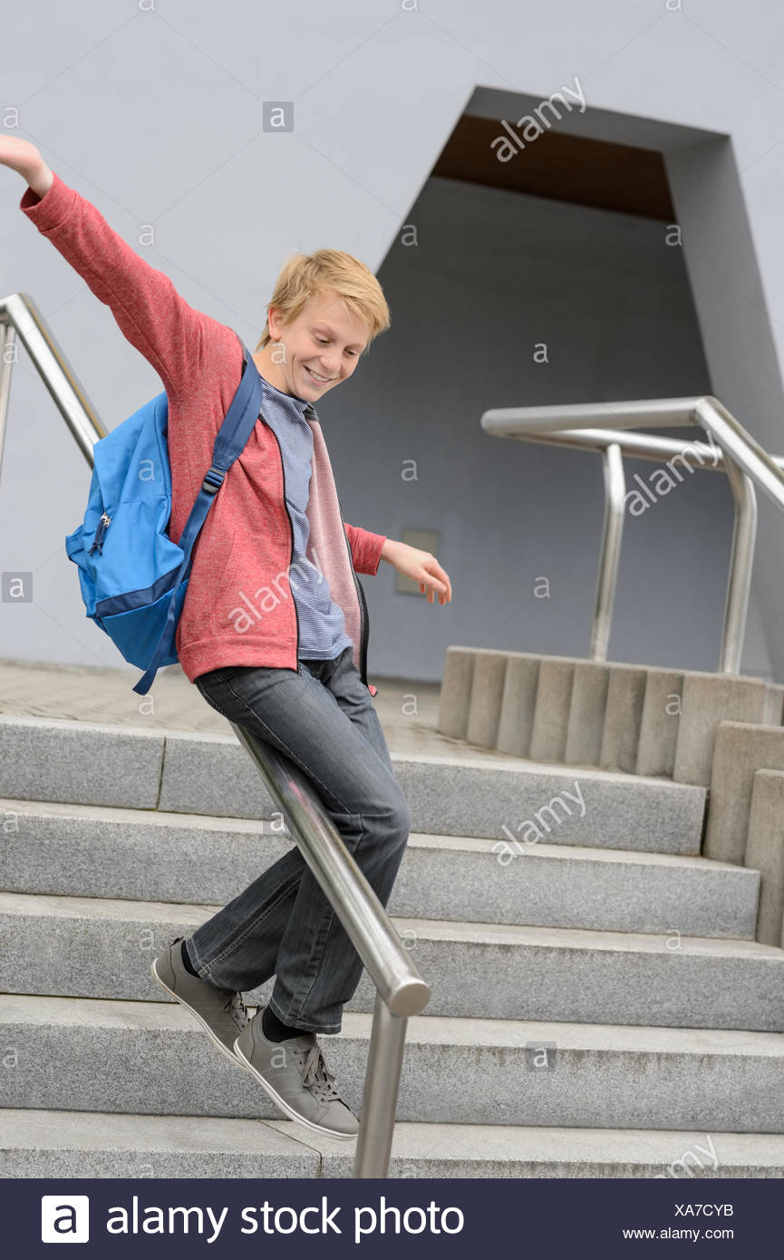 Student Sliding Down Railing On Stairway Stock Photo 281676287