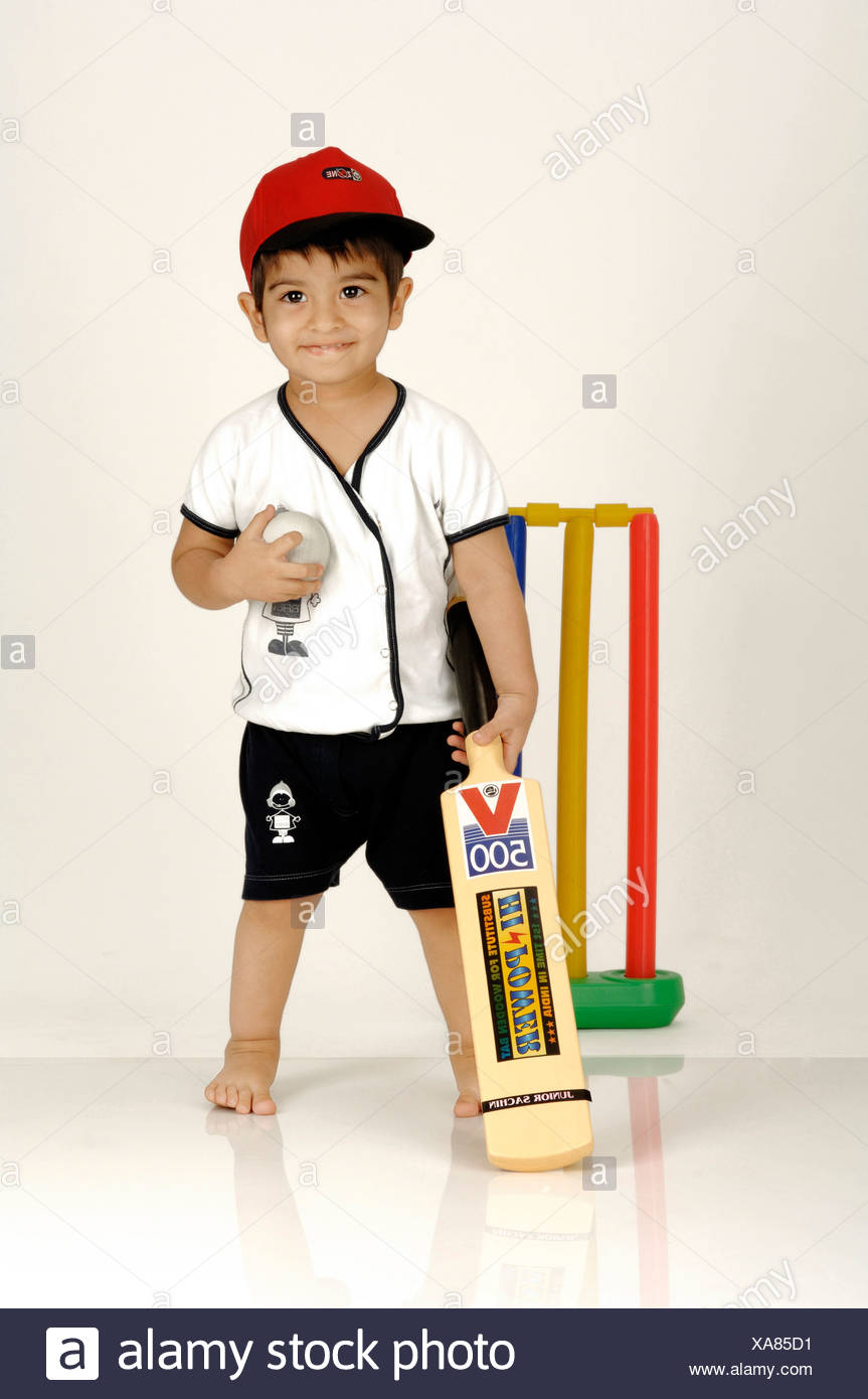 Children With Cricket Bat And Ball High Resolution Stock Photography