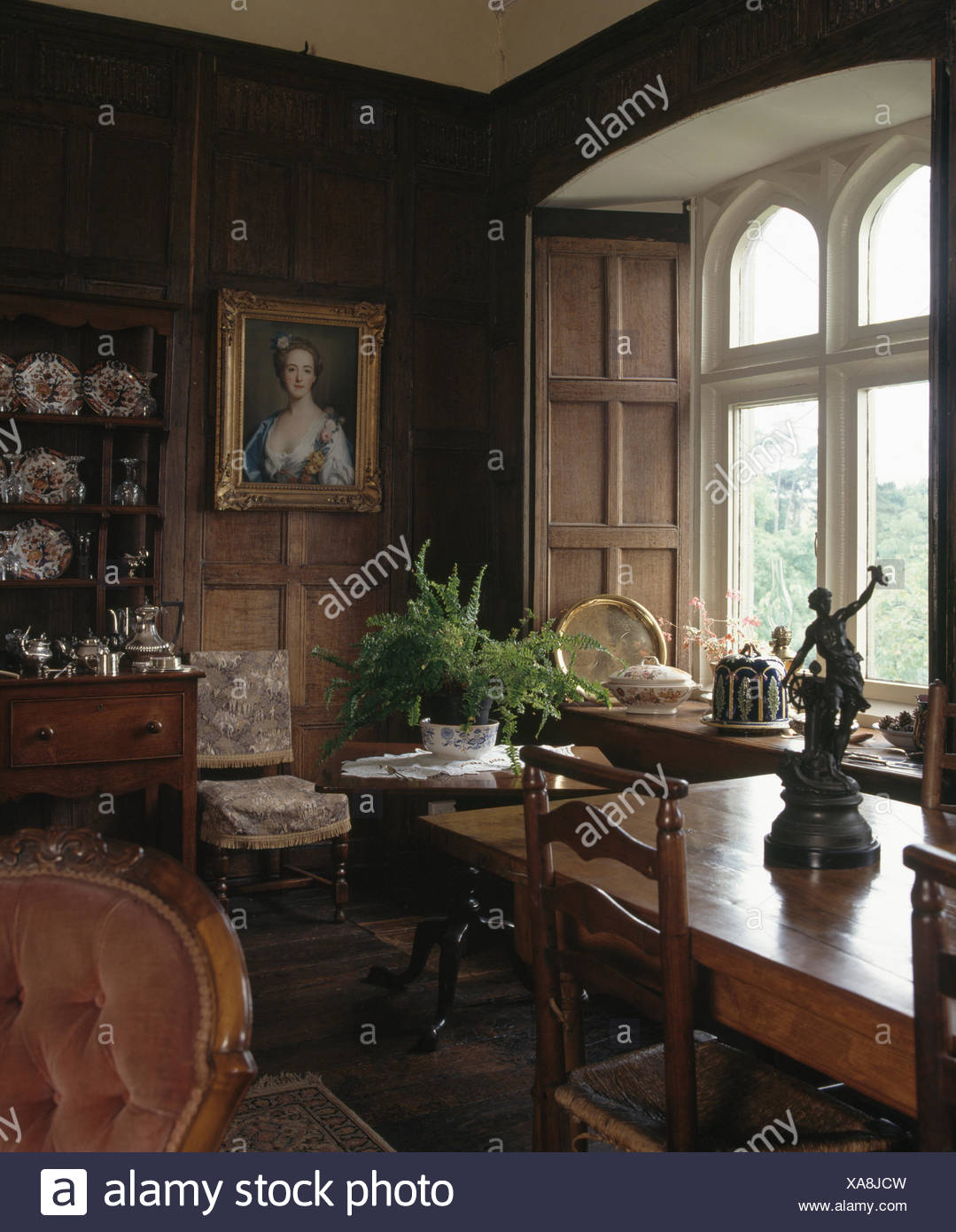 Antique Furniture In An Oak Panelled Country Dining Room
