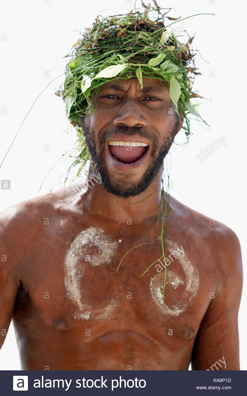 Portrait Of Melanesian Men With Green Hair Dress Made Of