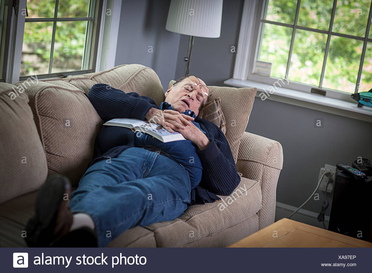 Old Man Sleeping In Living Stock Photos & Old Man Sleeping In Living