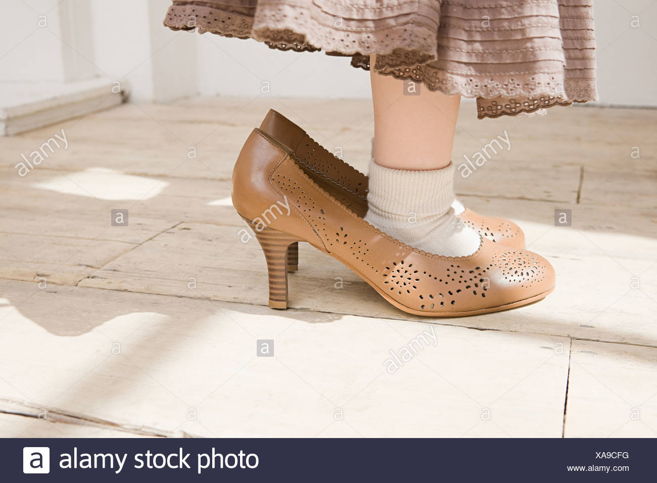 Young Girl Wearing High Heel Shoes High Resolution Stock Photography
