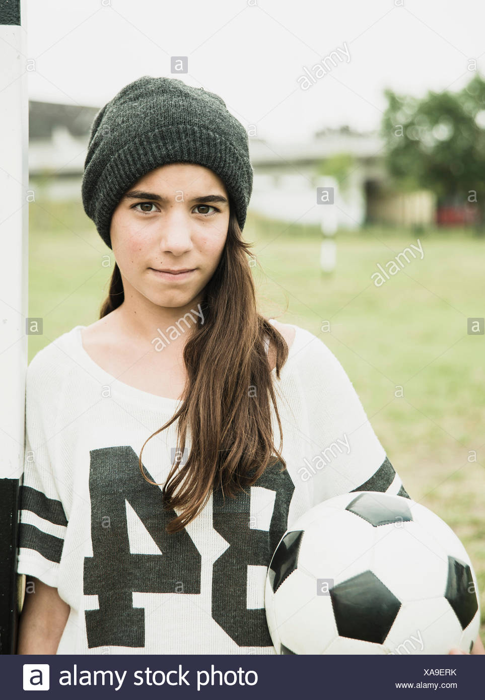 Girl Holding Soccer Ball High Resolution Stock Photography and Images