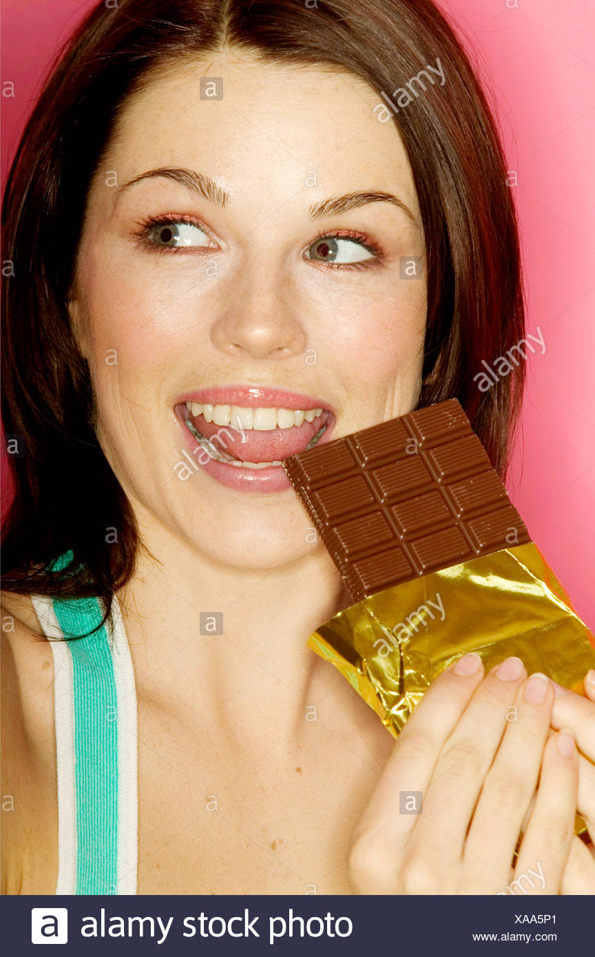 Woman Eating Chocolate Bar Naughty High Resolution Stock Photography and  Images - Alamy
