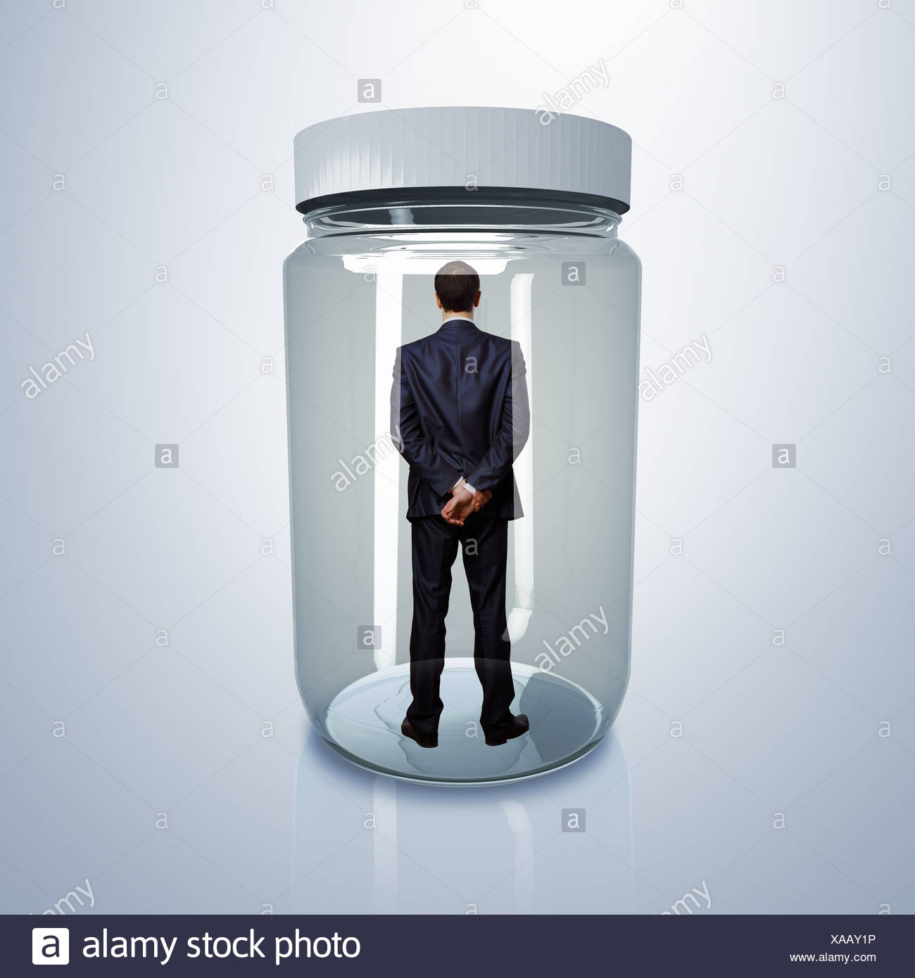 Download Businessman Inside Glass Jar Stock Photo Alamy Yellowimages Mockups