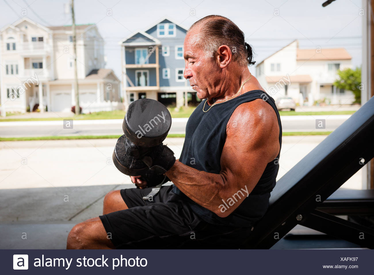 Man Home Dumbbell High Resolution Stock Photography and Images - Alamy