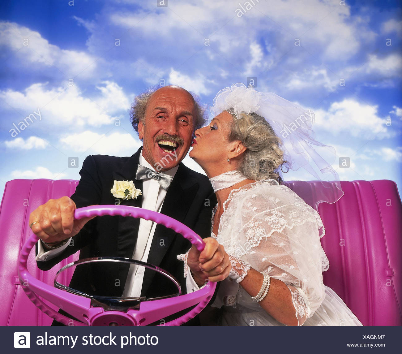 Bride And Groom Senior Citizens Motoring Cabriolet Pink