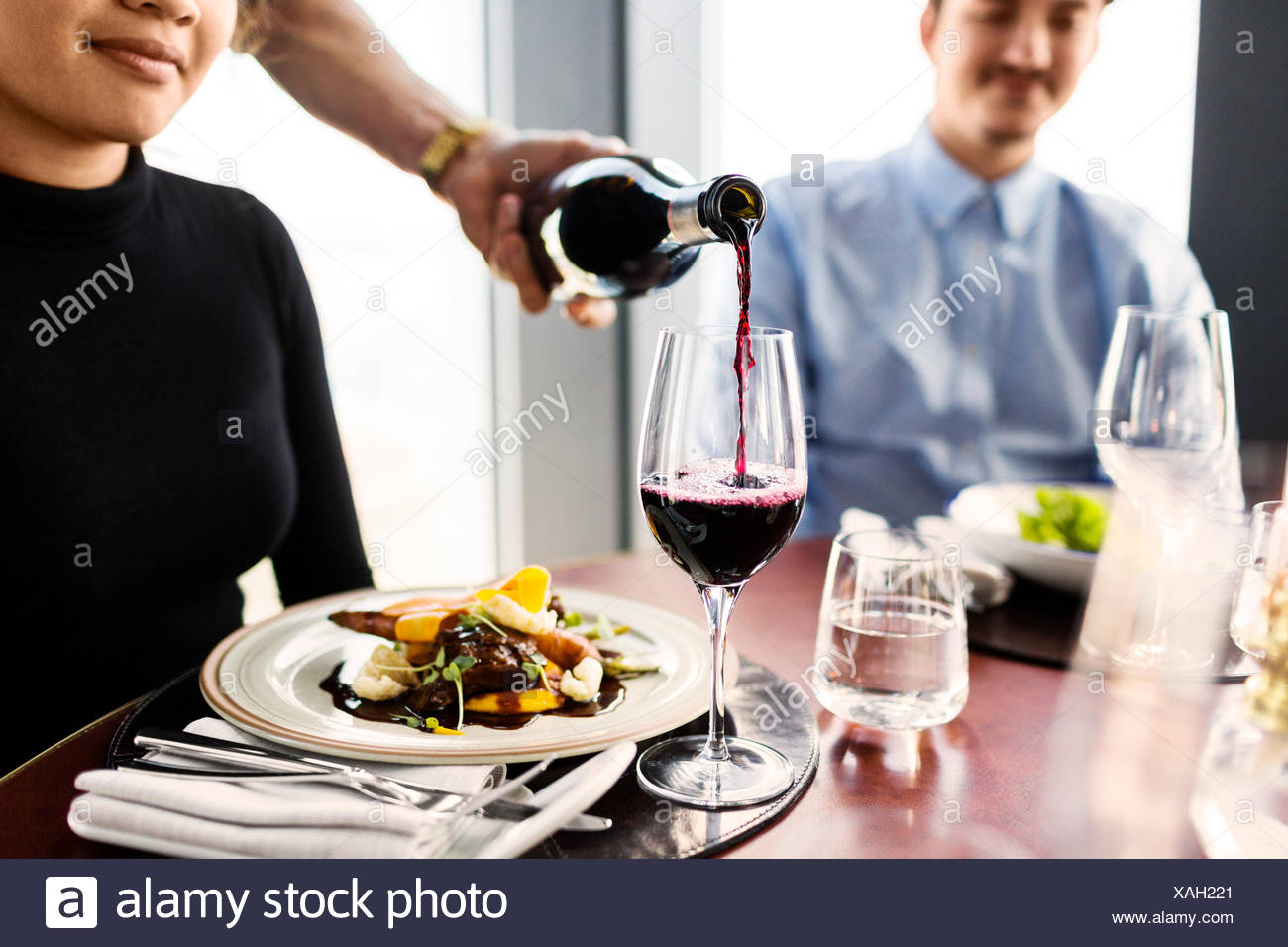 Wine Waiter Pouring Wine High Resolution Stock Photography and Images ...