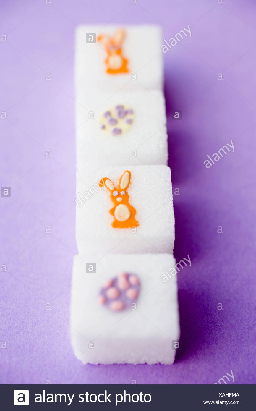 Sugar Cubes With Easter Decorations In A Row Stock Photo