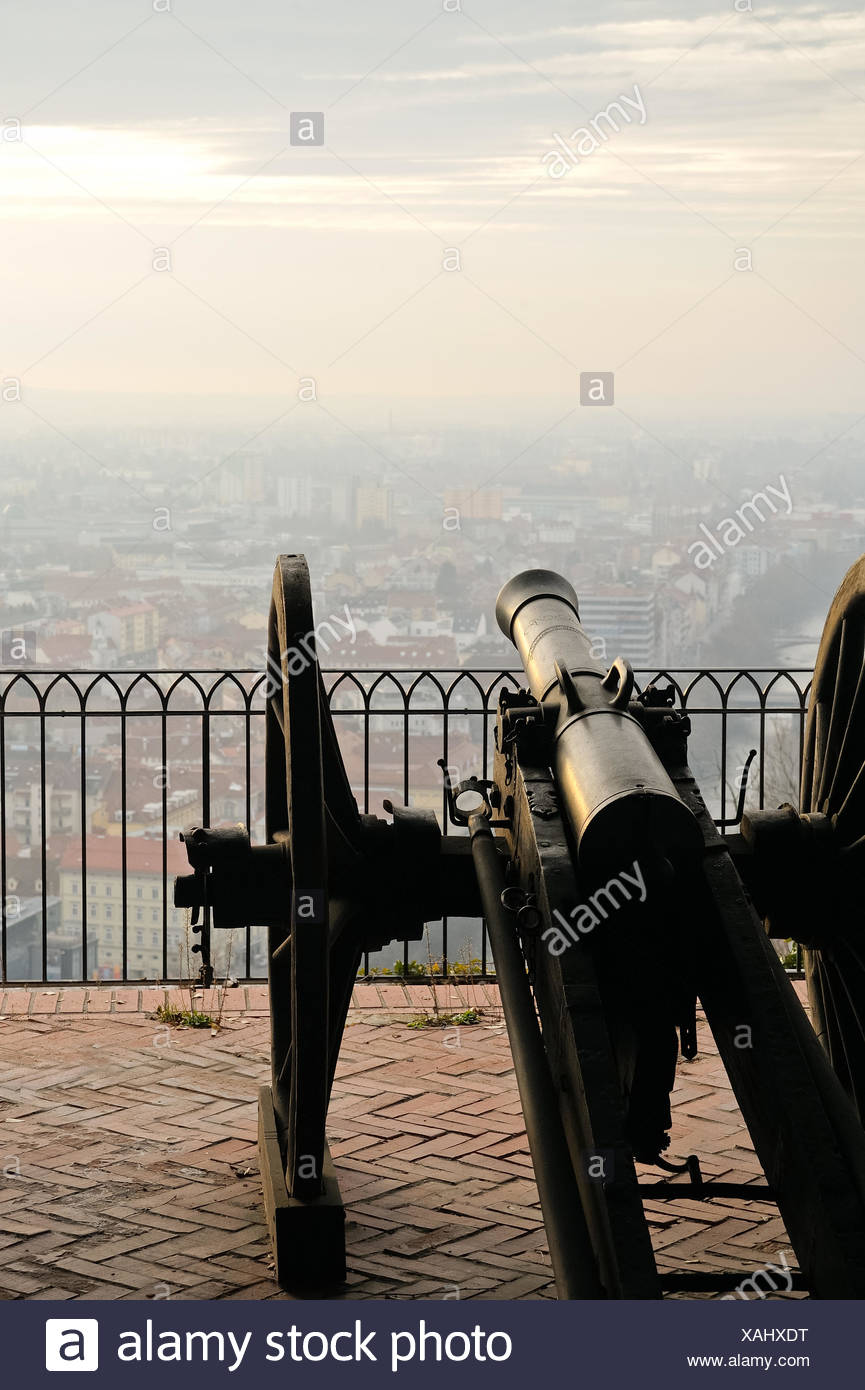 Old cannon on gun carriage aims to Graz Stock Photo