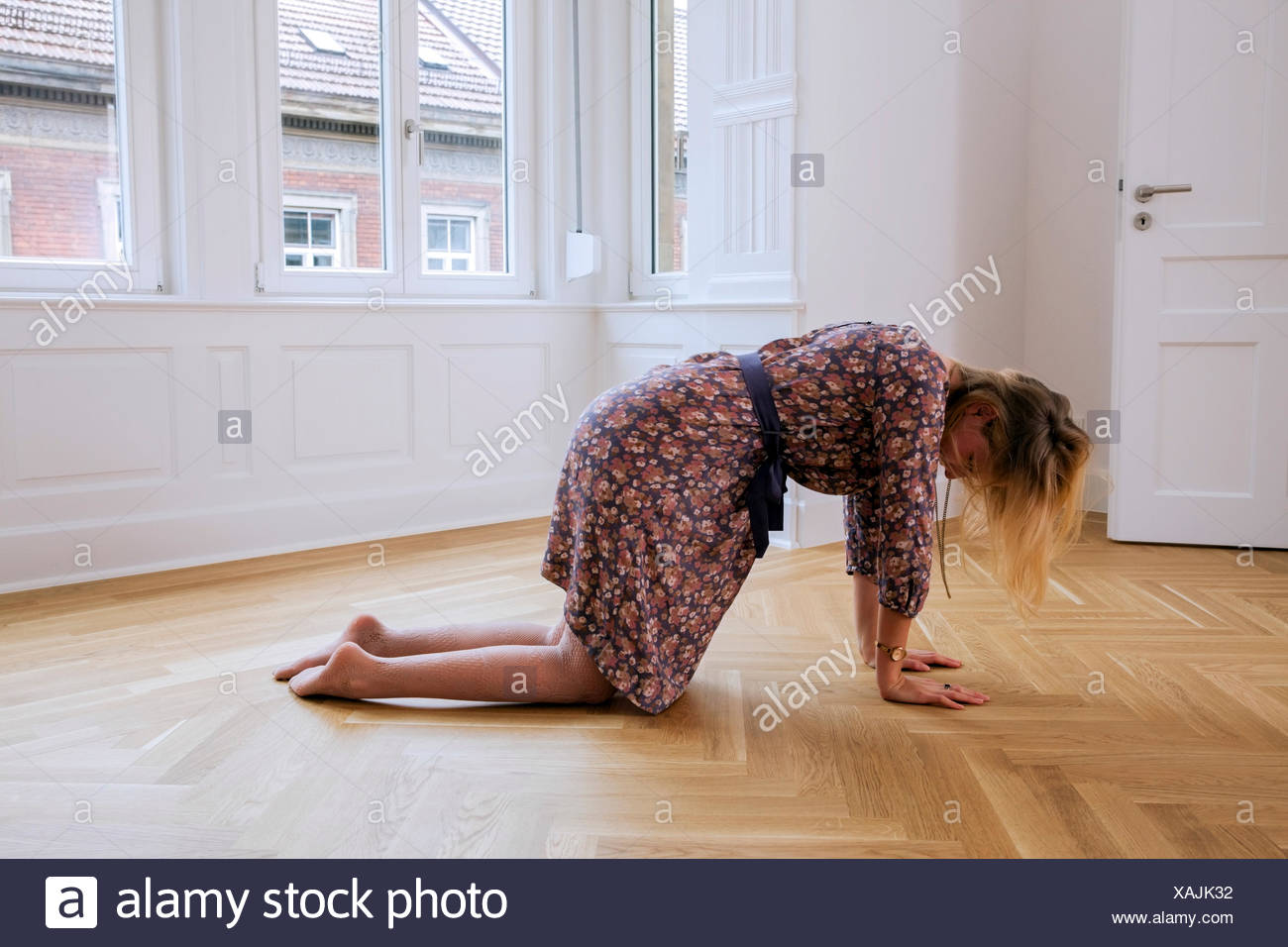 Woman In Dress Kneeling On High Resolution Stock Photography and Images ...