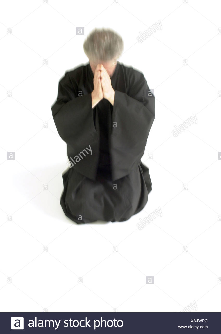 Man Kneeling Head Down High Resolution Stock Photography and Images - Alamy