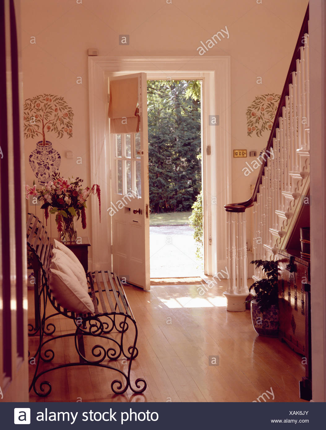 Metal Bench And Wooden Floor In White Country Hall With