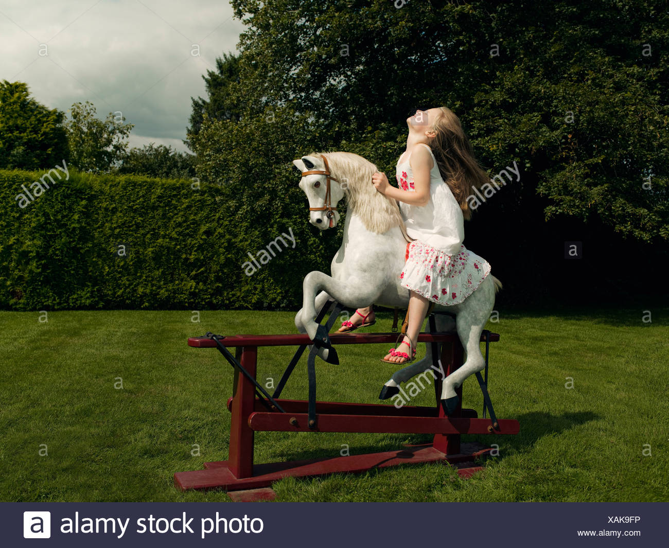 girl on a rocking horse
