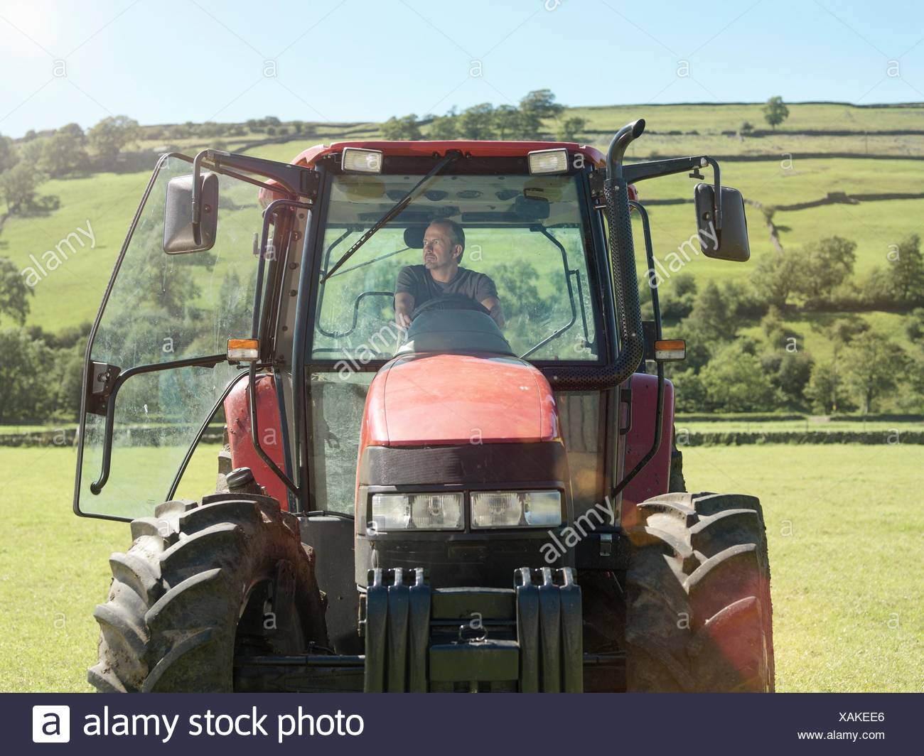 Farmer Driving Tractor High Resolution Stock Photography and Images Alamy
