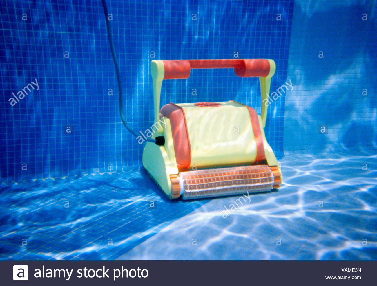 Pool Cleaner Underwater In Swimming Pool Stock Photo