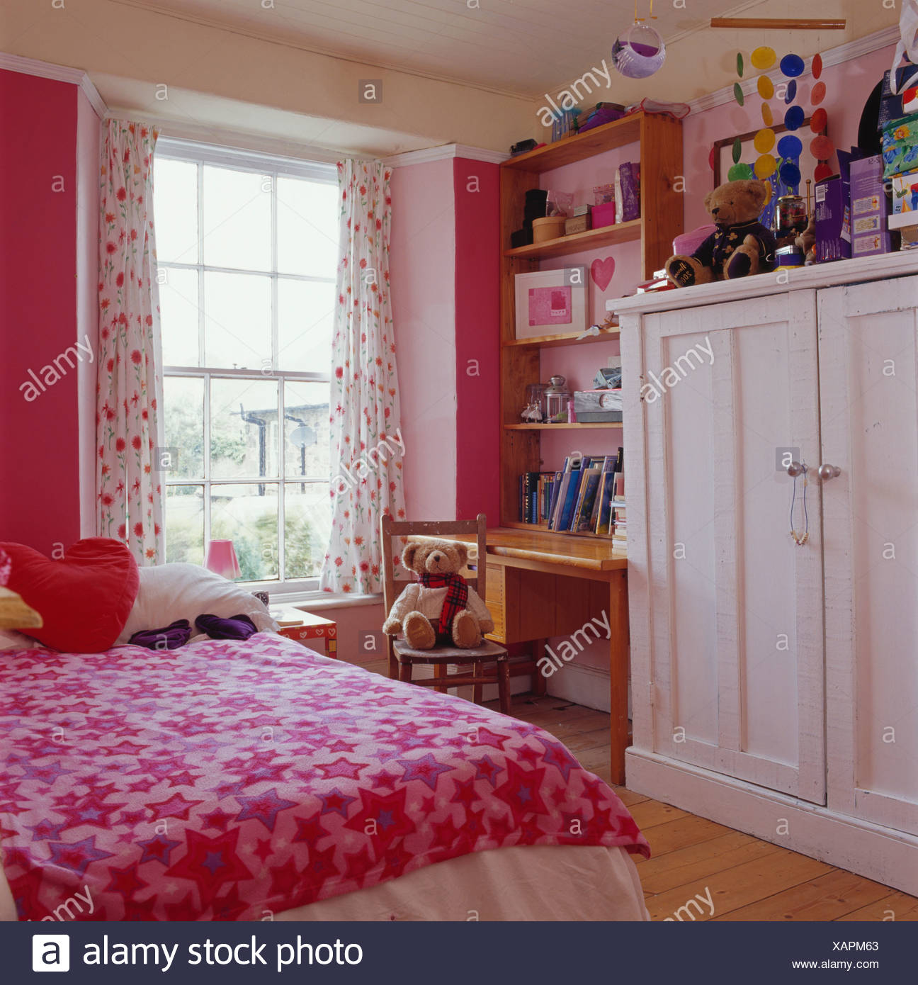 White Painted Wardrobe In Child S Pink White Bedroom With
