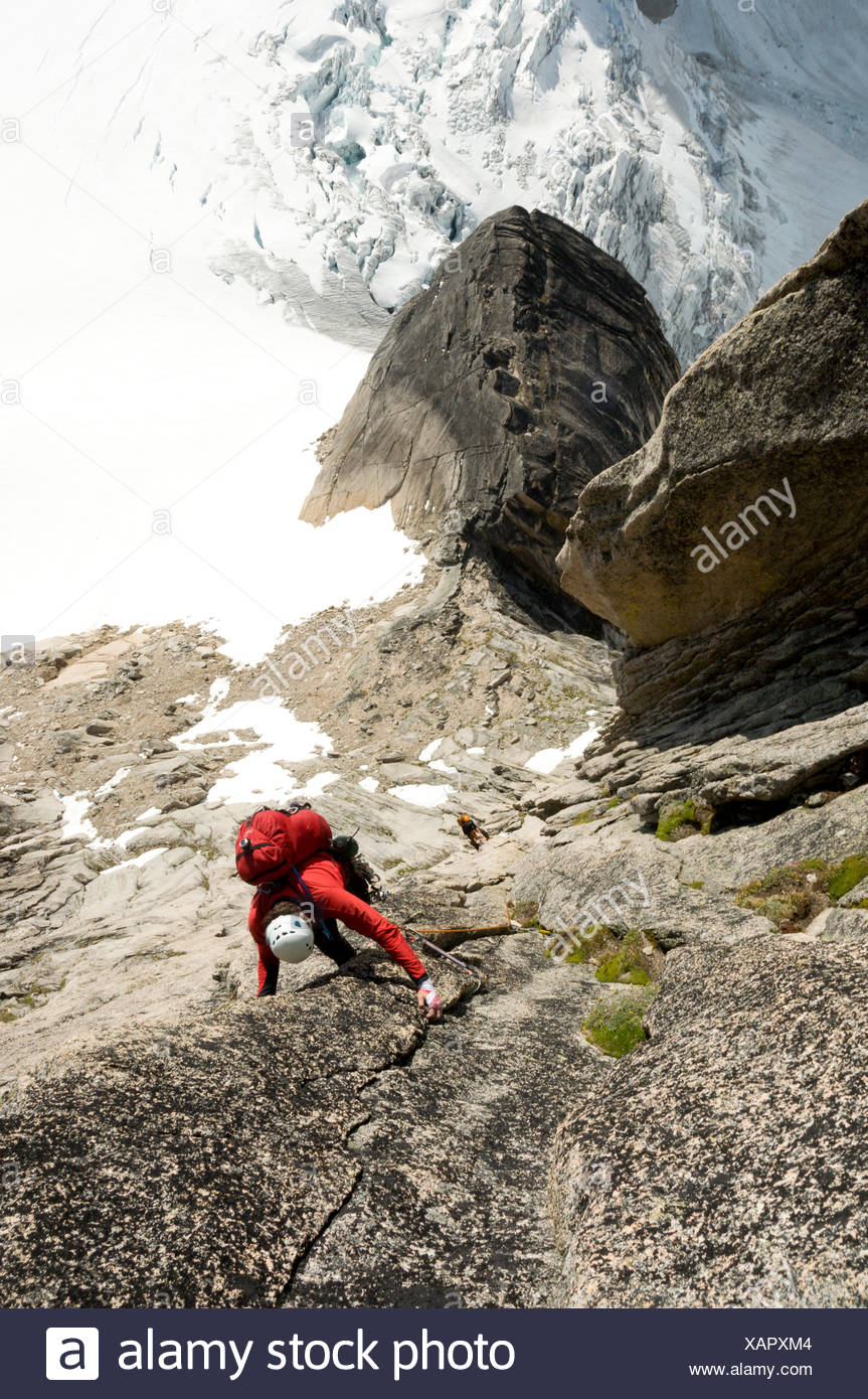 View From Above Of Rock Climber Climbing Crack Granite Route High
