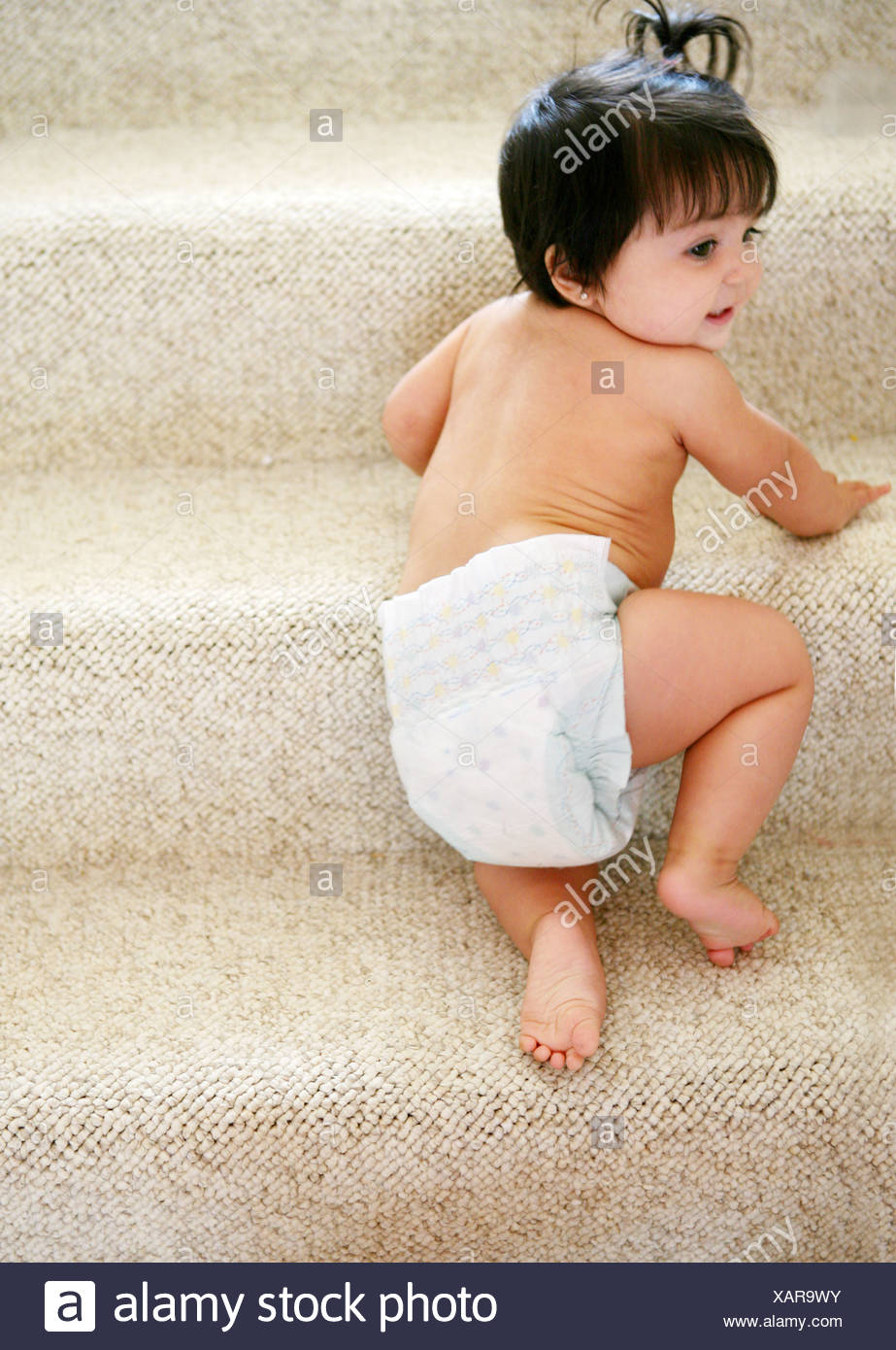 when do babies learn to climb stairs