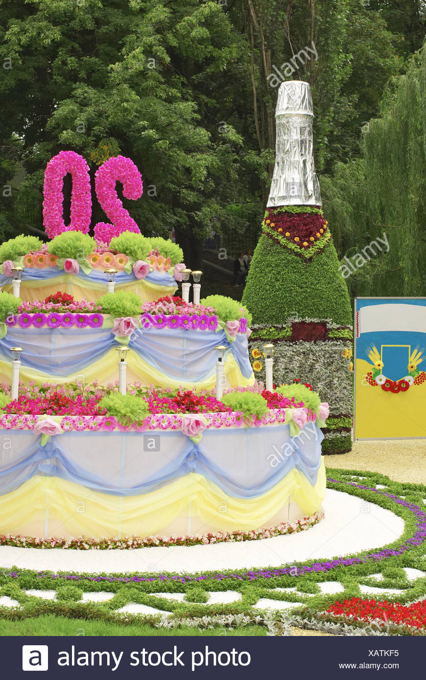 Birthday Cake And A Bottle Of Champagne From Flowers Stock Photo