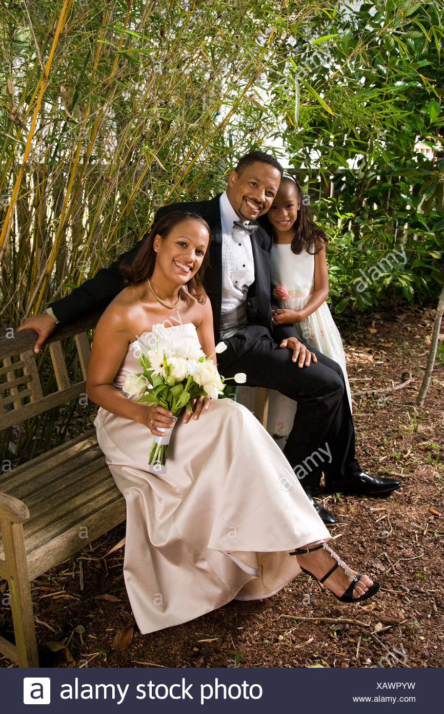 Happy African American Bride And Groom In Outside Nature Setting