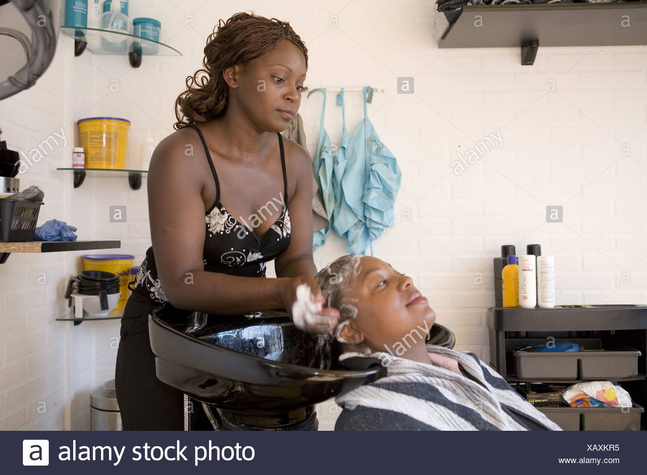 Over 30 African American Female Hairstylist Washing Female