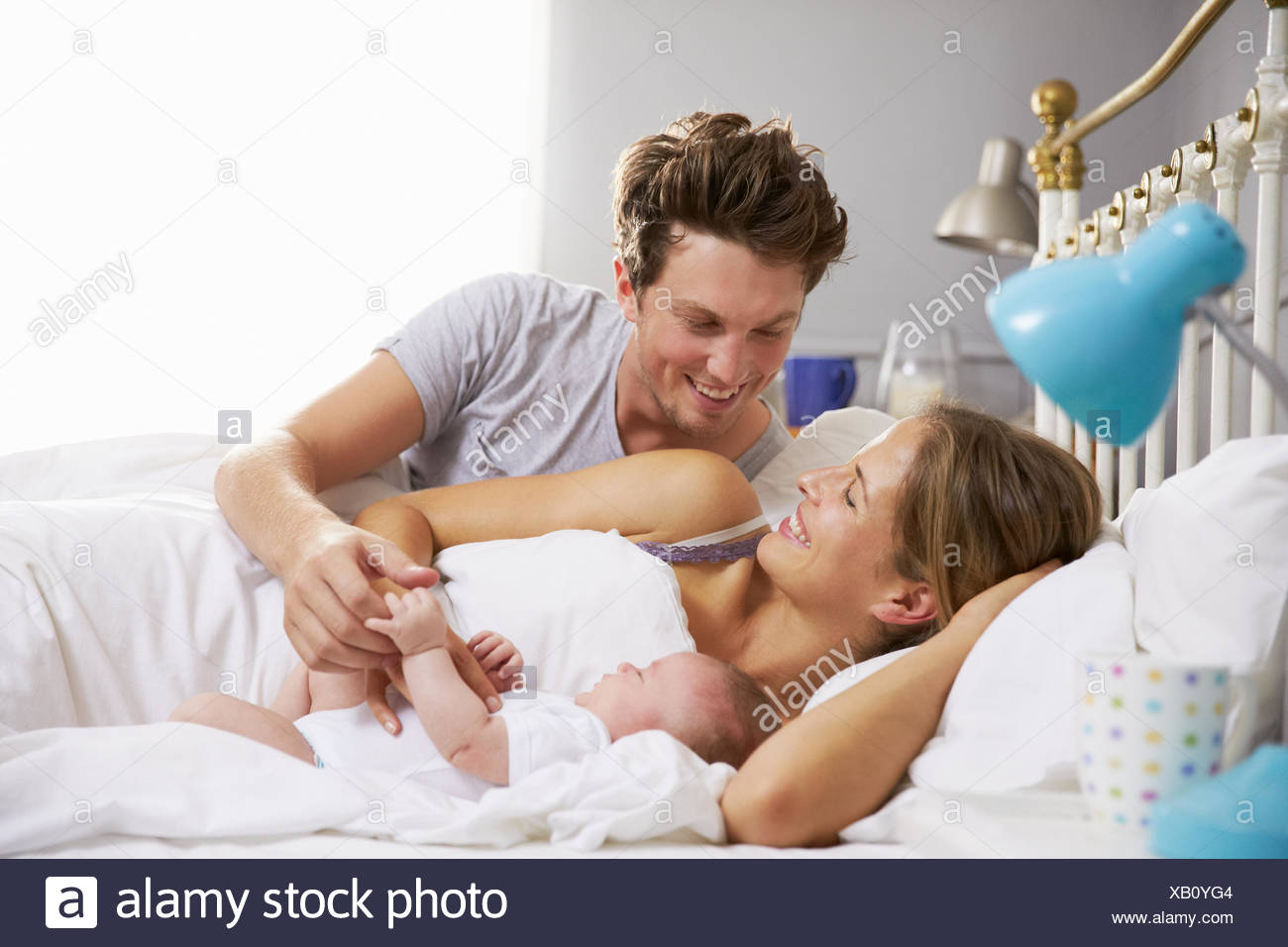 baby holding bed