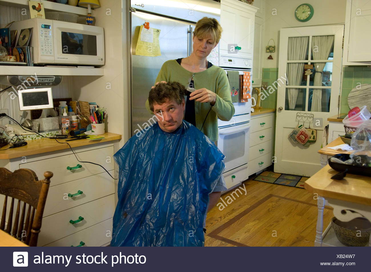 A Man Gets His Hair Cut At His Home In Lincoln Ne Stock Photo