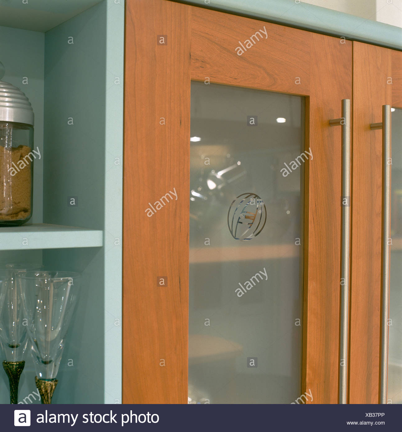 Close Up Of Modern Kitchen Cupboard Doors With Engraved Opaque