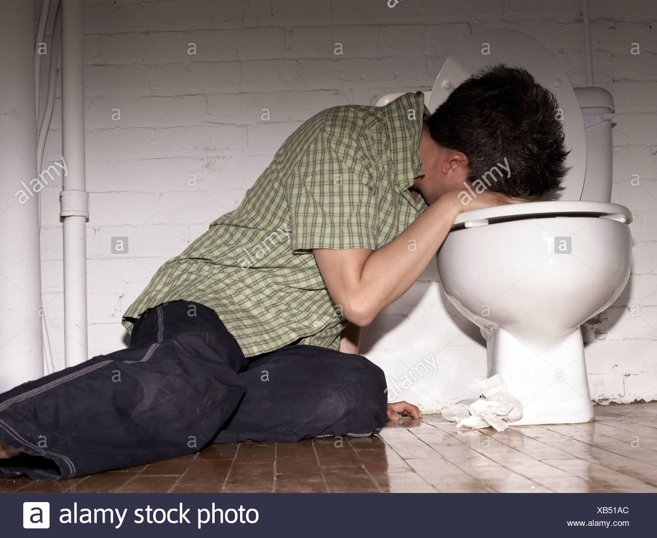 Throwing Up In Toilet High Resolution Stock Photography and Images Alamy