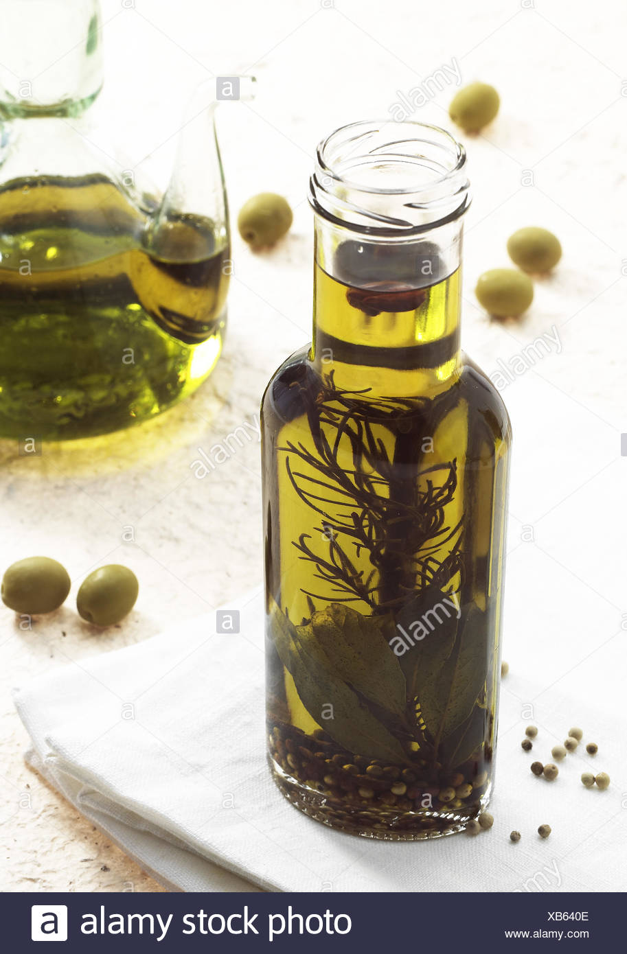 Download Olive Olea Europaea With Olive Oil Bottle Stock Photo Alamy PSD Mockup Templates