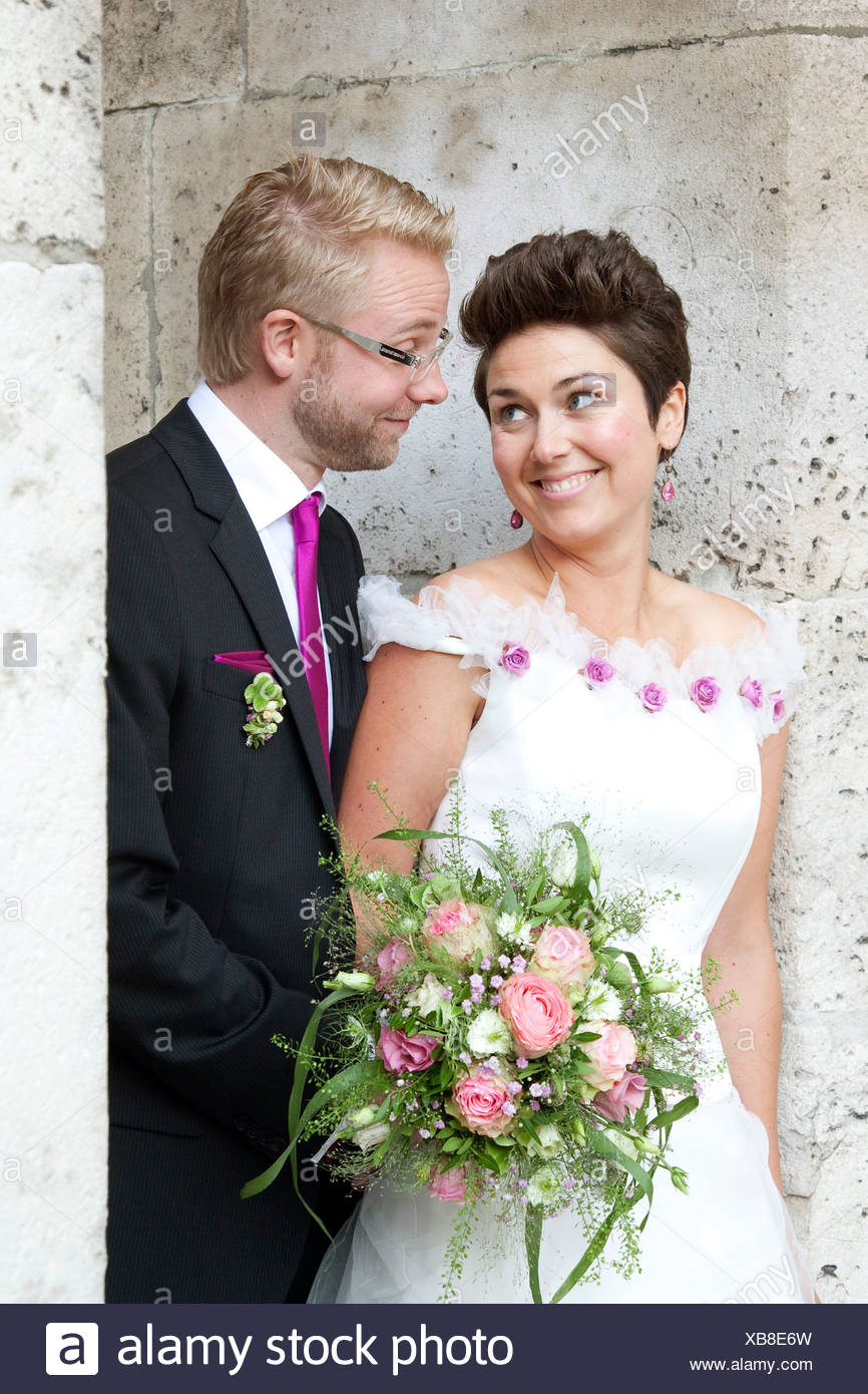 https://c8.alamy.com/comp/XB8E6W/bridegroom-and-bride-in-regensburg-bavaria-germany-europe-XB8E6W.jpg