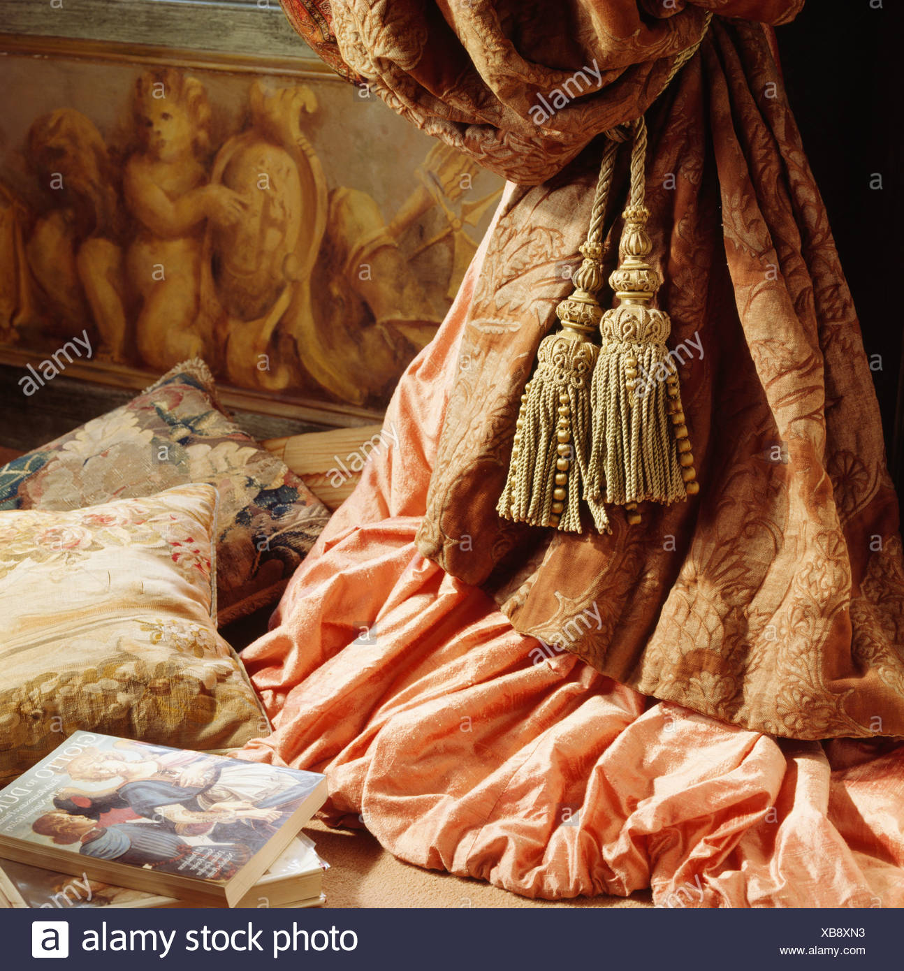 Close Up Of Pink And Cream Tapestry Drapes With Tassels Stock