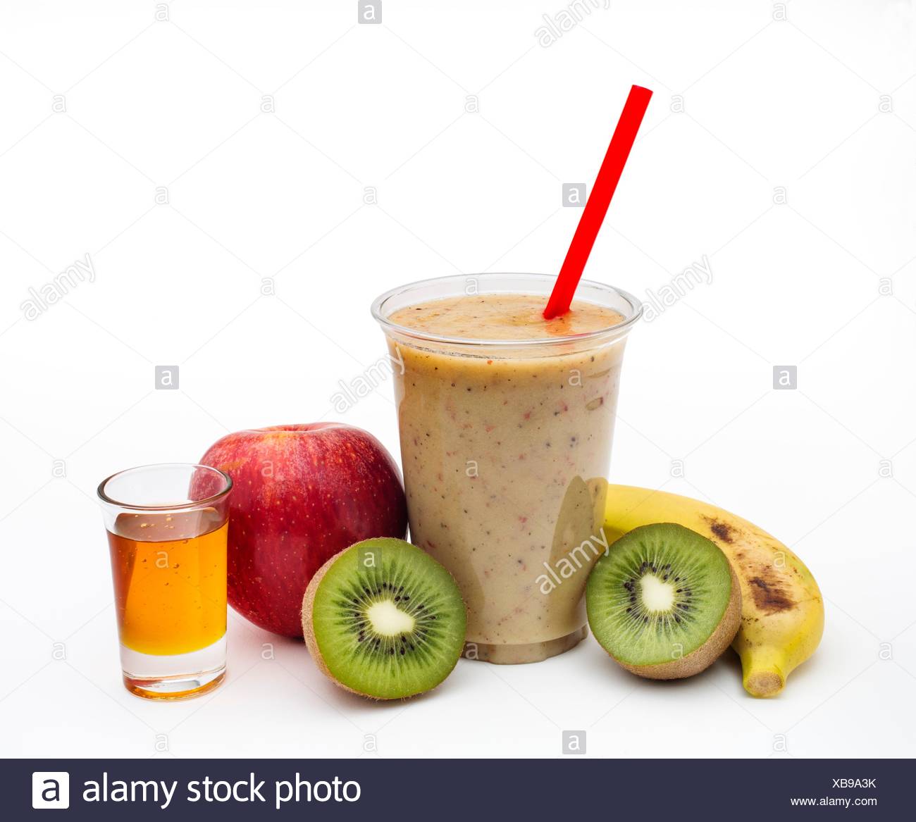Natural juice: kiwi, banana, apple and honey Stock Photo ...