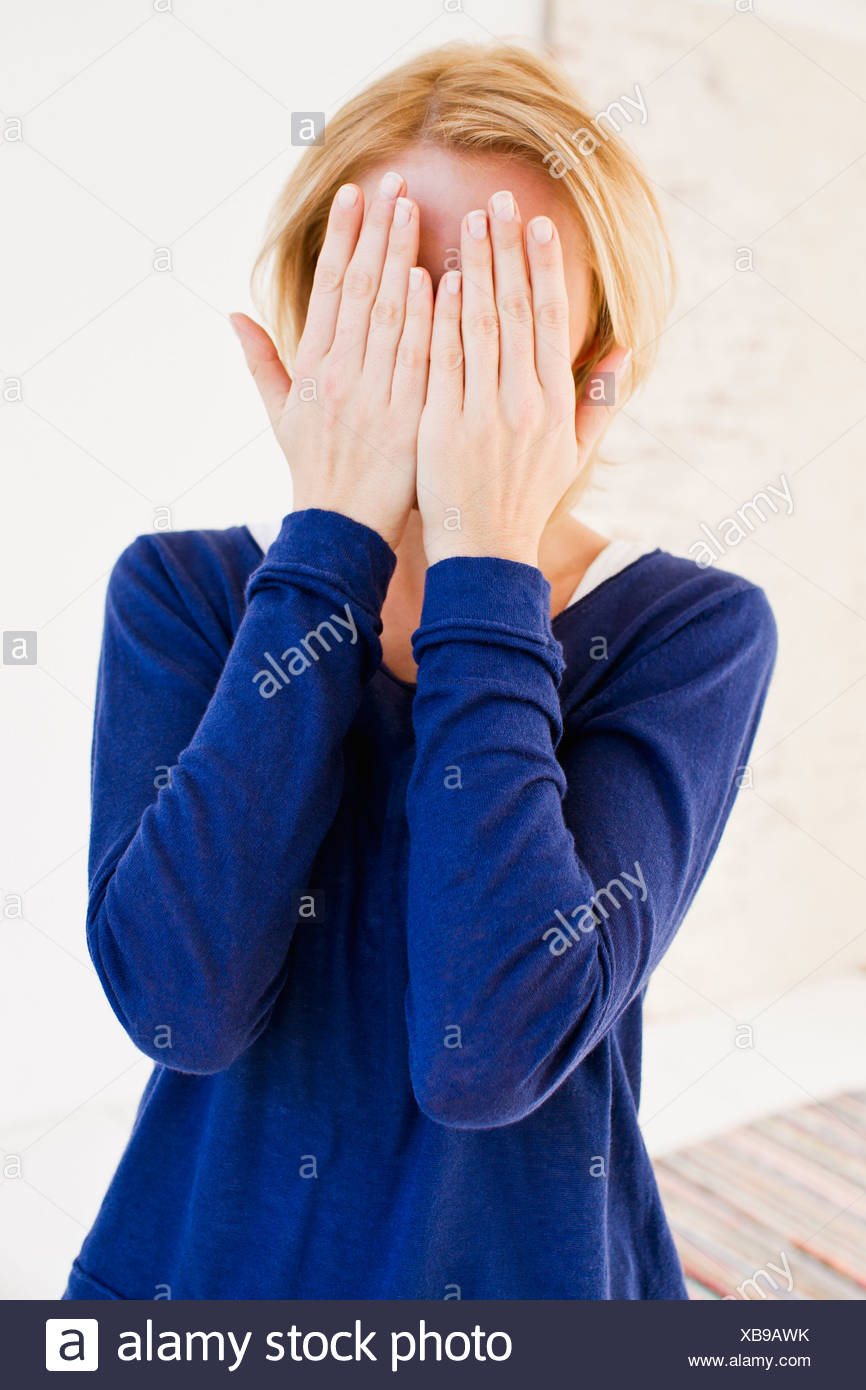 Hiding Face Behind Hands Stock Photos & Hiding Face Behind Hands Stock