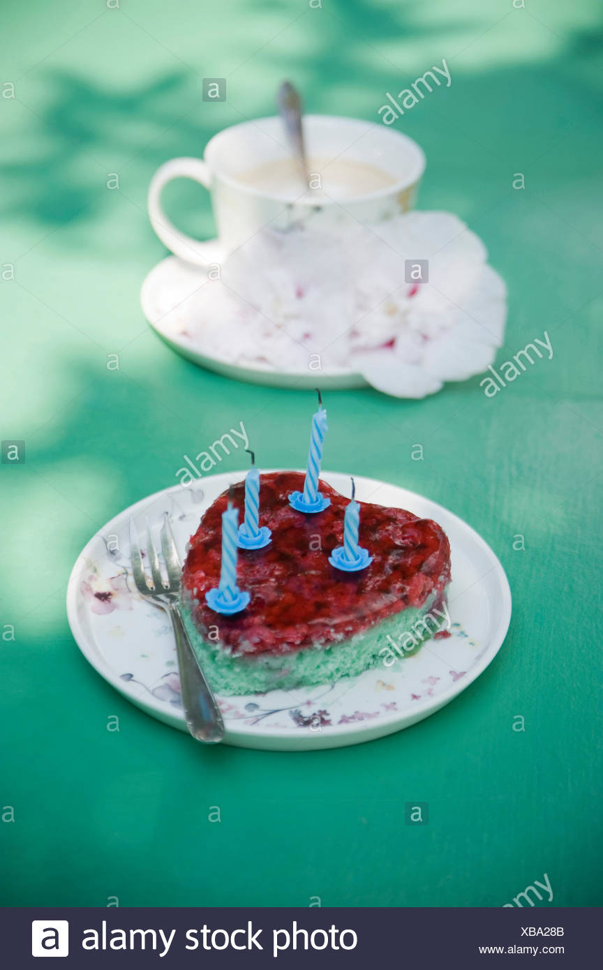 Heart Shaped Birthday Cake And Coffee Cup With Flowers Stock Photo