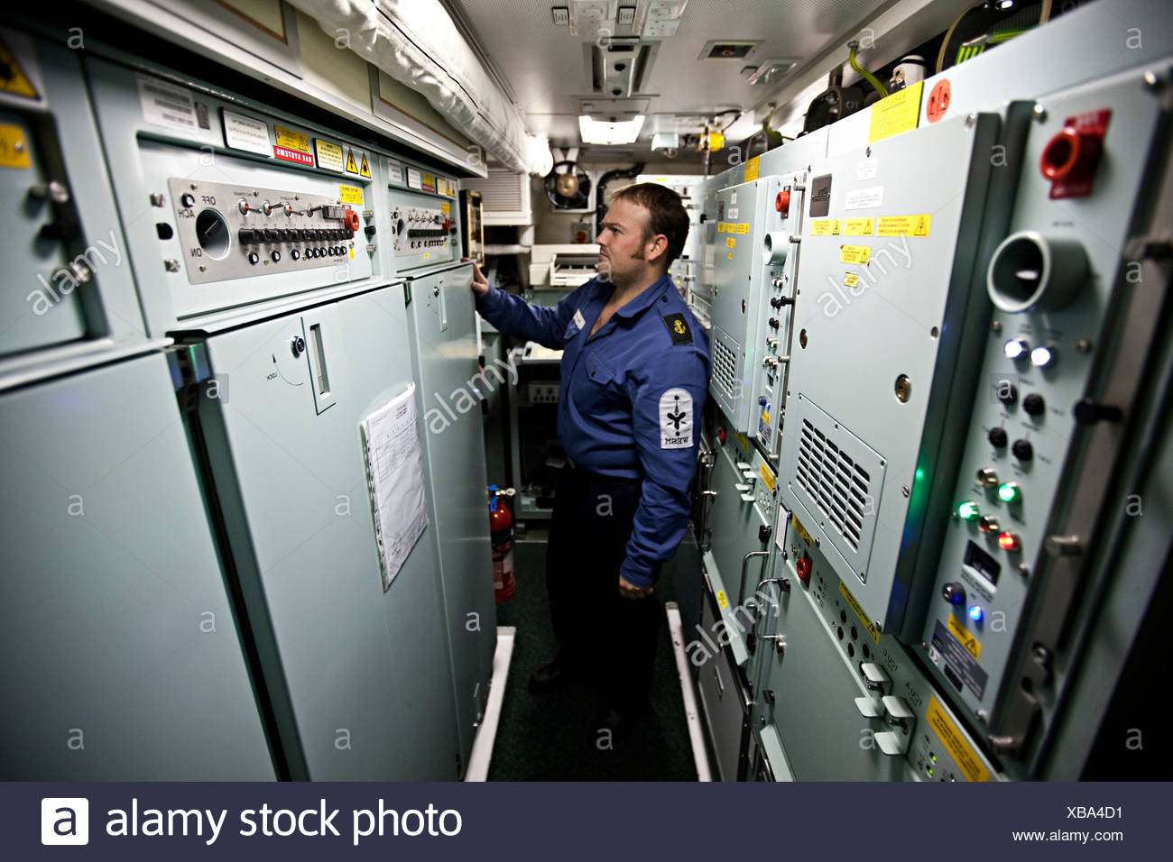 Man Stands In Control Room Of Nuclear Submarine Hms Talent